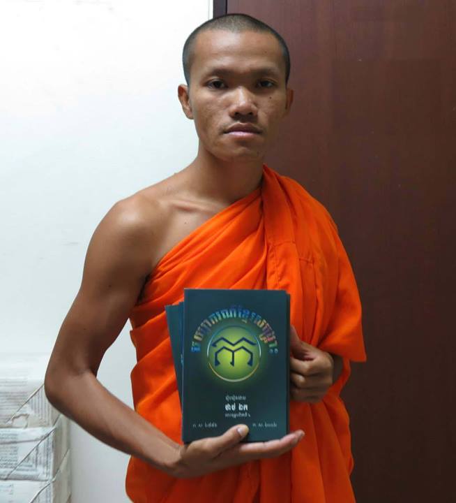 Thach Chan Dara holds Khmer Grammar Book that was prohibited from being distributed in Vietnam